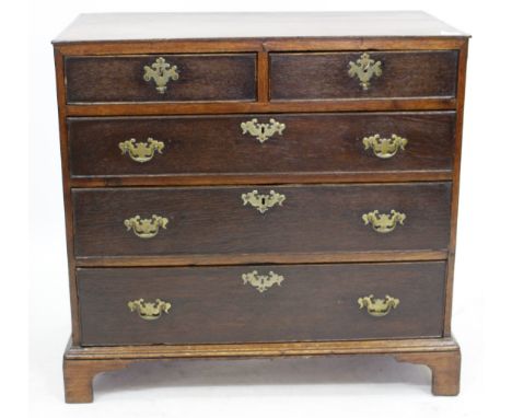 A 19TH CENTURY OAK CHEST OF TWO SHORT AND THREE LONG DRAWERS raised on bracket feet, 82cm wide 