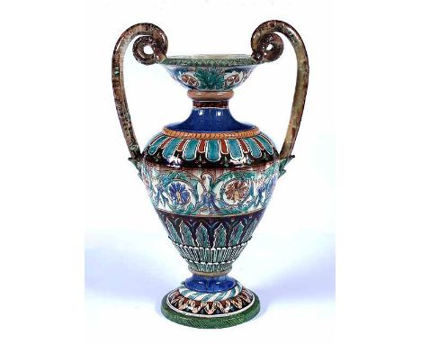 AN ANTIQUE CONTINENTAL TIN GLAZED TWO HANDLED VASE, possibly Thune, the vase of classical form with bands of polychrome ename