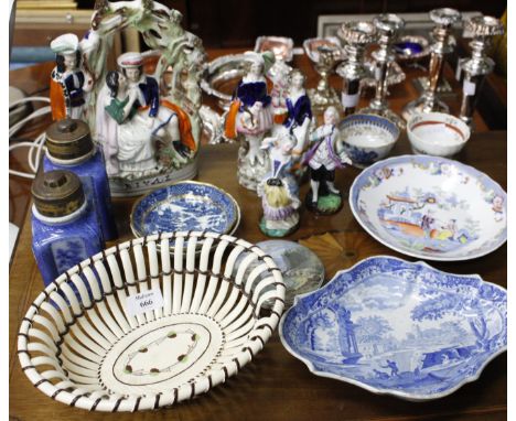 AN ANTIQUE CREAMWARE OVAL BASKET, possibly Leeds, together with a pair of flow blue canisters by Batty & Co., two tea bowls a