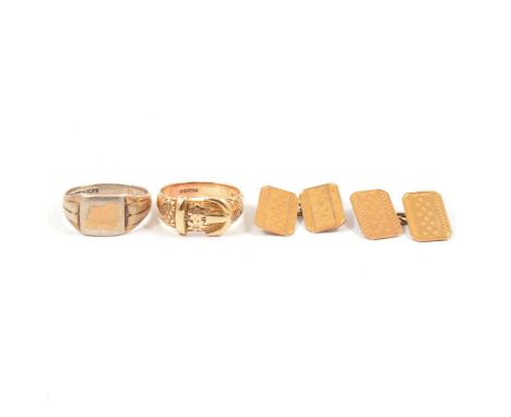 A 9 carat yellow gold buckle ring size S, London 1966, 6g, a pair of 9 carat yellow gold chain link cufflinks, engine turned 