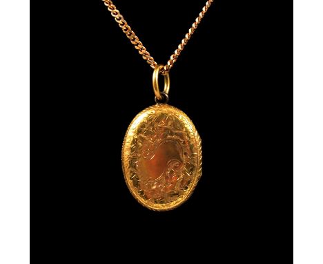 A collection of gold and yellow metal jewellery, an oval carved shell cameo brooch, female profile facing right in a yellow m