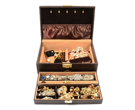 A jewellery box with lift out tray containing modern and vintage costume jewellery, gold-plated and white metal brooches; nec