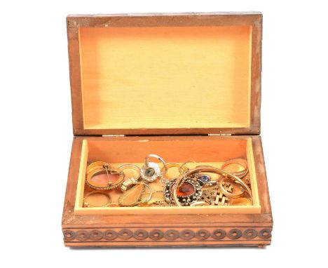 A wooden box with costume jewllery, gold-plated rings, earrings and bracelet; a 5mm wide half hinged bangle with metal core; 