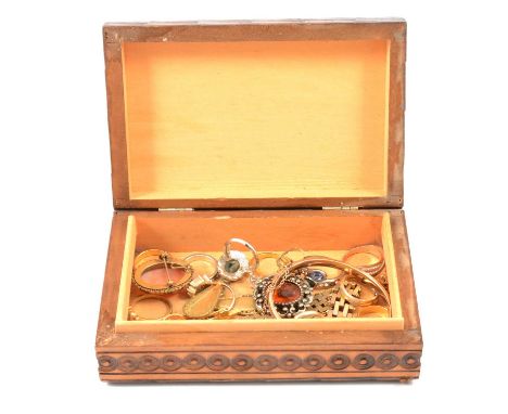 A wooden box with costume jewllery, gold-plated rings, earrings and bracelet; a 5mm wide half hinged bangle with metal core; 