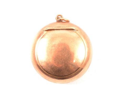 An Edwardian gold patch box by Gourdel Vales &amp; Co with down puff, the 9 carat rose gold plain polished circular box, 32mm