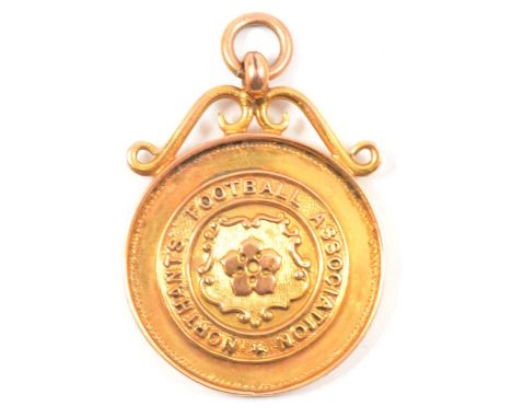 A 9 carat yellow gold Northants Football Association Medal, Lower Junior Cup Winners 1923-24, A M Underwood, hallmarked Birmi