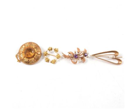 Four vintage brooches, a 9 carat yellow gold 40mm flower and leaf spray set with two amethyst and three cultured pearls, Lond