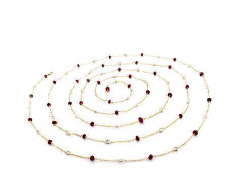 Vintage Approx. 8.25 Carat TW Round Brilliant Cut Diamond, 12.8 Carat Ruby Bead and 18 Karat Yellow Gold 72" Long Necklace. A