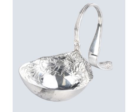International Sterling Punch Ladle. Floral Repousse motif. Signed. Measures 7". Weighs approx 7.09 troy ounces. Condition: Go