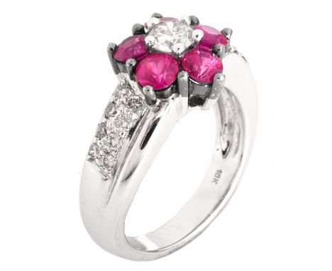 Approx. 1.05 Carat Ruby, .45 Carat Diamond and 18 Karat White Gold Ring. Stamped 18K. Ring size 4-1/2. Approx. weight: 6.4 gr
