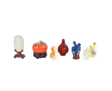 Grouping of Seven (7) Oriental Tableware. Includes: 3 snuff bottles, 2 carved figurines(lapis and Quartz), jade carving, and 