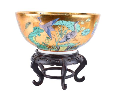 20th Century Chinese Porcelain Bowl On Stand. Decorated with birds and flowers on a gold ground. Signed. Bowl measures 5-1/2"