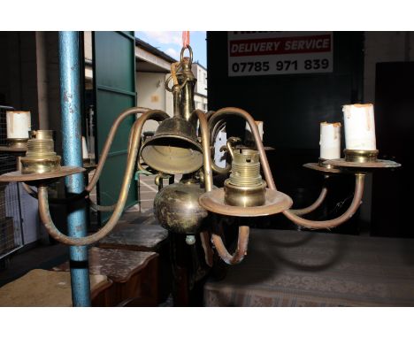 A pair of brass Dutch style eight light chandeliers approx 58cm diameter