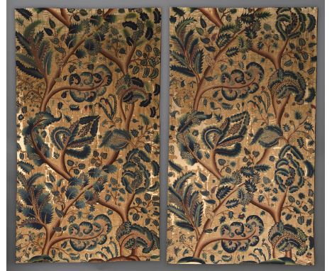 A LATE 17TH CENTURY CREWELWORK PANEL, the linen ground designed with climbing branches of bold leaves worked with mainly blue