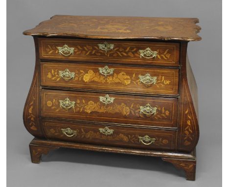 AN 18TH CENTURY DUTCH MARQUETRY COMMODE, of bombé form, the shaped rectangular top above four drawers, all with floral inlay,