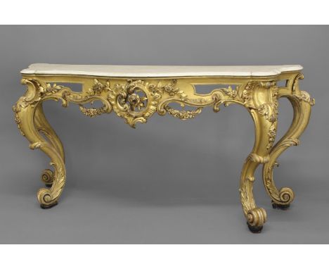 A 19TH CENTURY MARBLE TOPPED GILTWOOD CONSOLE TABLE, of serpentine form, the white marble top above a pierced frieze carved w