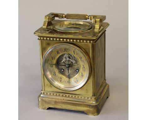 A VICTORIAN BRASS CASED MANTLE CLOCK AND BAROMETER, the circular dial with recessed centre with visible escapement, surrounde