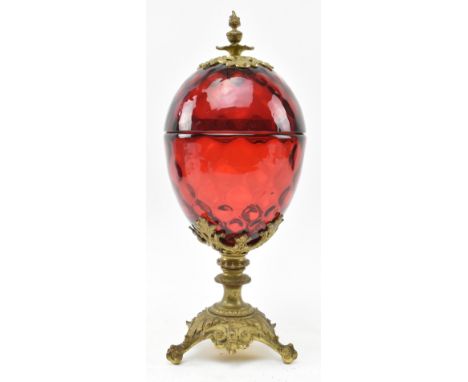 A believed French Palais Royal early 20th century ruby red glass and ormolu bon bon trinket box in the shape of an egg. The b