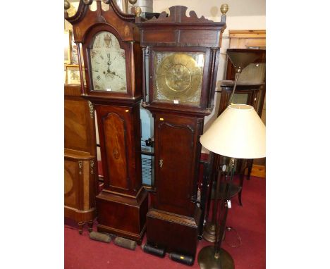 A circa 1800 provincial oak and mahogany crossbanded longcase clock, the brass dial signed Wynstanley, Holywell, with eight-d