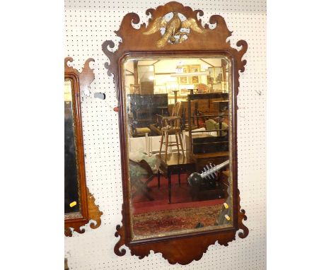 A 19th century Chippendale style mahogany fret cut rectangular wall mirror, with gilt eagle surmount (lacking head), 113 x 62