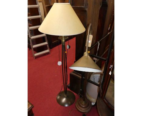 A contemporary brass floor light, having adjustable branch arm and on circular stepped base; together with a bronzed metal st