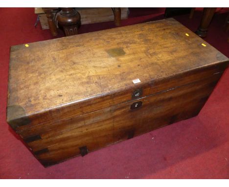 A 19th century camphorwood and brass bound campaign hinge top travelling trunk, having single iron end handle (one missing), 
