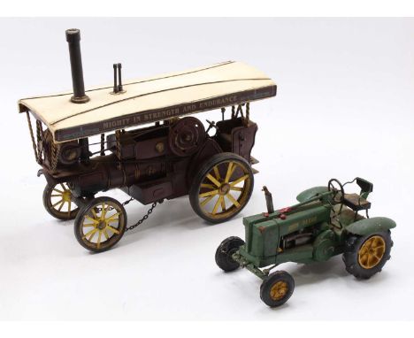 A modern issue tinplate model of a Fowler Showmans Traction Engine together with that of a John Deere Tractor