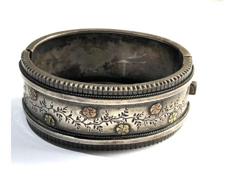 Antique Victorian silver hinged cuff bangle measures approx 2.5cm wide 