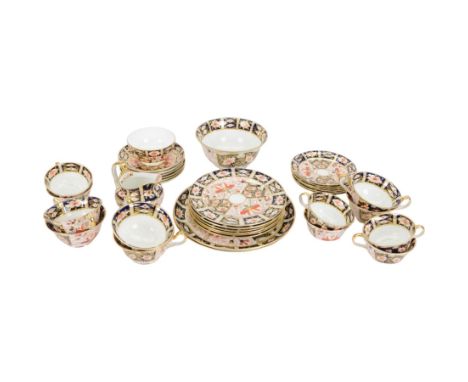 Royal Crown Derby part tea service, decorated in the Imari pattern  2451, including twelve cups and saucers in two sizes, six