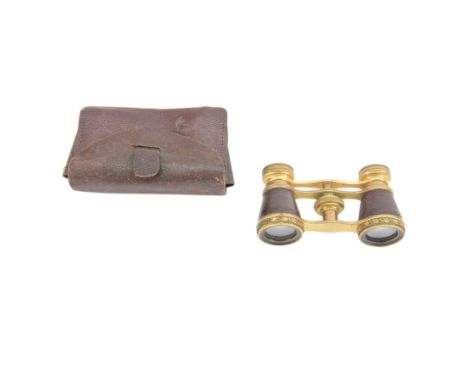 Pair of early 20th century opera glasses by Negretti & Zambra, brown leather with gilt leaf decoration, in soft brown leather