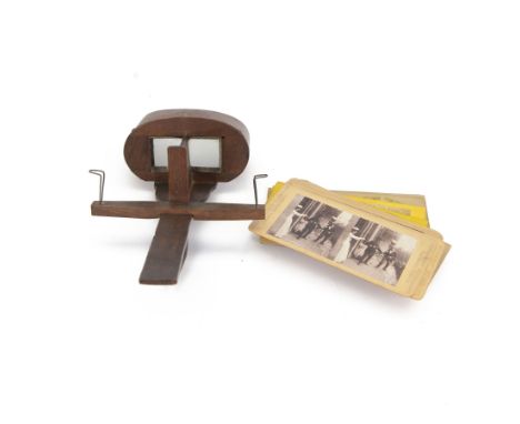 Wooden stereoscope and a collection of stereoscope cards, including views of English and World scenery