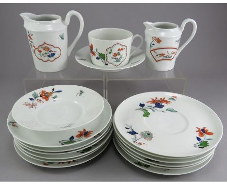 A twentieth century Limoges part tea service, some pieces marked for Christian Dior 'Imari'. To include: two jugs, a cup and 