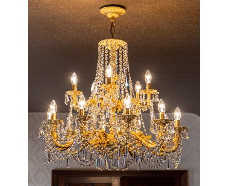 A gilt metal fifteen light pendant electrolier with cut glass droppers, drop approximately 95cm 