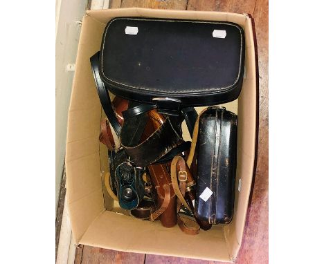 An assorted collection of cameras, binoculars, dagger; others