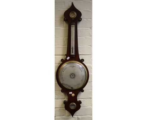 An early 19th brass inlaid mahogany "onion-top" Four function mercurial wheel barometer, thermometer by Fasketh? of Banbury.1