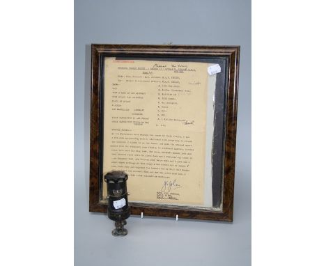 A WWII bakelite cased 5C/366 cockpit lamp, together with a facsimile J.E "Johnnie" Johnson Personal Combat Report.