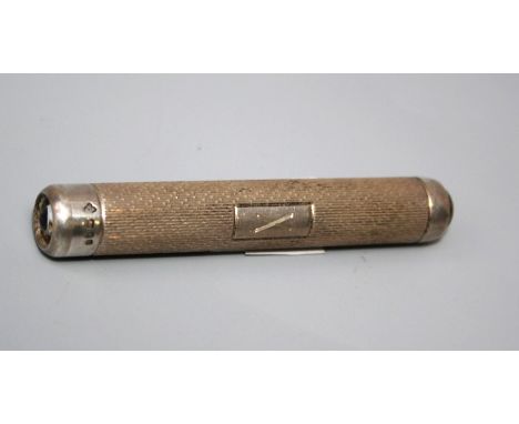 A 20th century Asprey of London silver pocket flashlight/ pen torch, with engine turned decoration.London 1994 by Asprey of L