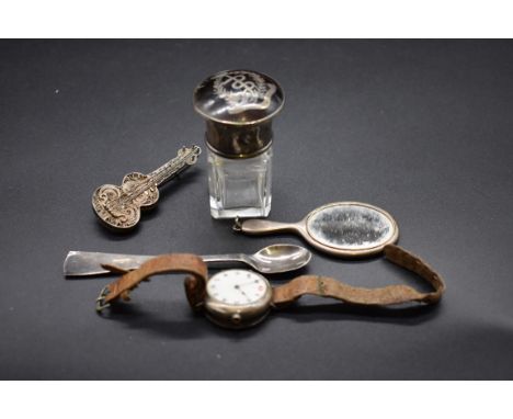 A vintage Rolex silver manual wind wristwatch, 29mm; together with a novelty miniature silver hand mirror; and three other it