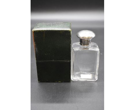 An Edwardian leather cased silver mounted glass scent flask, by Norman Marshall, London 1908, 12.5cm high. 