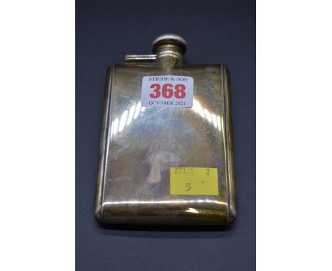 A Tiffany &amp; Co sterling hip flask, 12.5 x 7.5cm. 