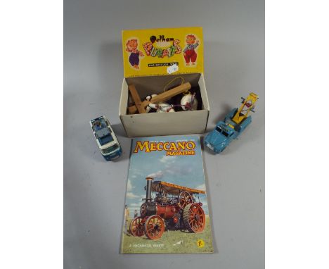 A Corgi Commer Bus, A Budgie Towing Tender, A Boxed Pelham Foal and A Meccano Magazine for 1956.