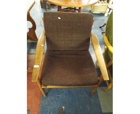 A Vintage Teak Arm Chair.