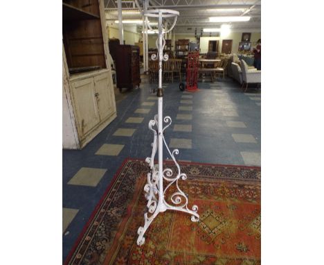 A Victorian Brass Mounted Wrought Iron Adjustable Oil Lamp Stand with Tripod Support. 