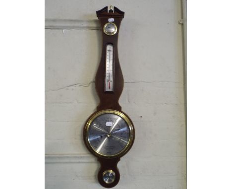 A Modern Mahogany Wheel Barometer.
