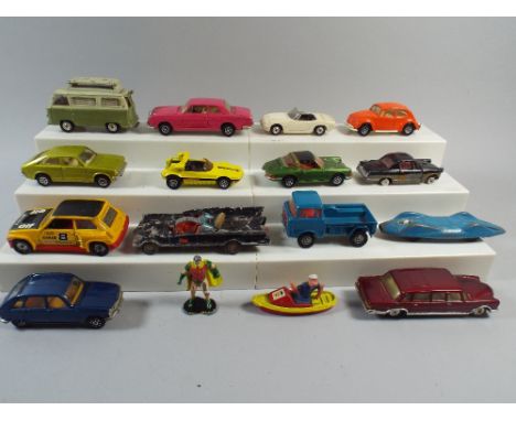 A Collection of Sixteen Corgi Die Cast Cars Figures Etc. 