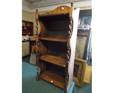 An Oak Four Shelf Open Bookcase with Barley Twist Supports.