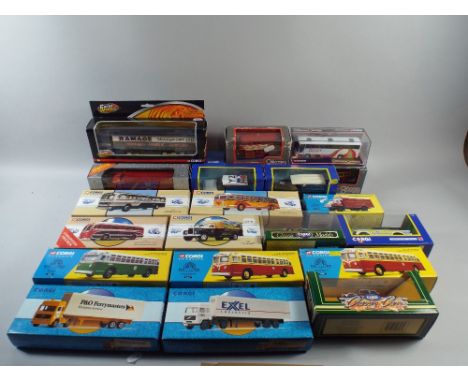 A Collection of Twenty Two Boxed Corgi Classic Buses Cars and Commercial Vehicles. 
