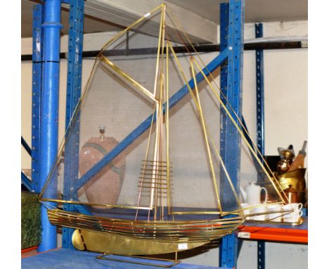 LARGE NOVELTY BRASS FIRE SCREEN MODELLED AS A YACHT    