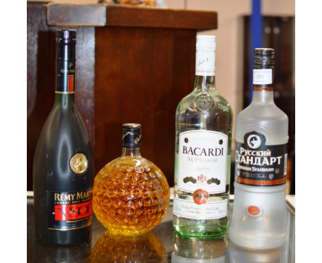 4 BOTTLE SPIRIT SELECTION COMPRISING RUSSIAN STANDARD VODKA - 70CL, 40% VOL, BACARDI SUPERIOR - 1 LITRE, 37.5% VOL, REMY MART