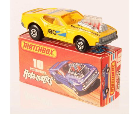 Matchbox Superfast 10b Piston Popper US Issue - yellow body with black &amp; blue racing number 60 tampo print, light amber w